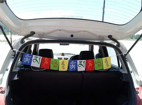 Car vastu Tibetan prayer flag ribbon hanging meaning in Telugu