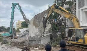 HYDRA team recovering government land in Hyderabad, Banjara Hills land recovery operation,